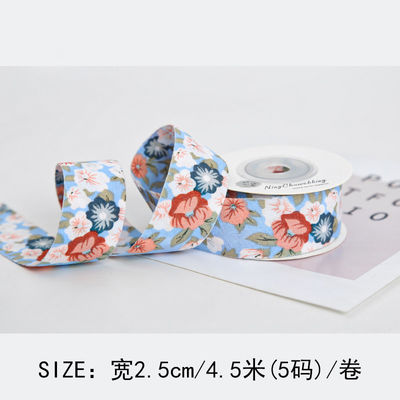 Gepersonaliseerd gebogen prentband 40 mm bloemenprentband