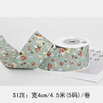 Gepersonaliseerd gebogen prentband 40 mm bloemenprentband