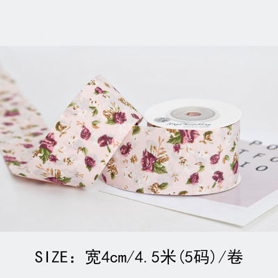 Gepersonaliseerd gebogen prentband 40 mm bloemenprentband