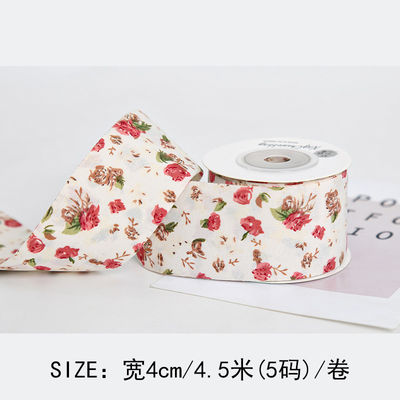 Gepersonaliseerd gebogen prentband 40 mm bloemenprentband