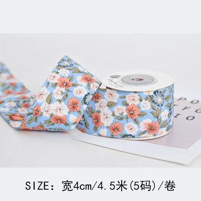 Gepersonaliseerd gebogen prentband 40 mm bloemenprentband