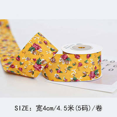 Gepersonaliseerd gebogen prentband 40 mm bloemenprentband